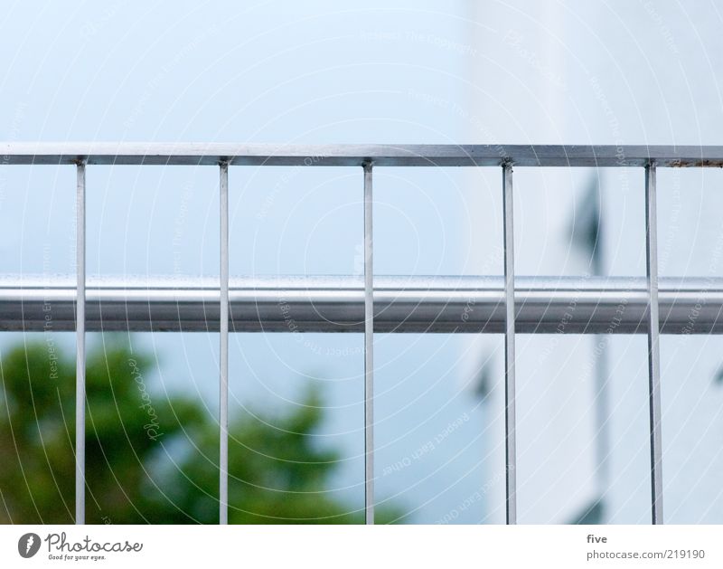 behind bars Environment Nature Sky Cloudless sky Plant House (Residential Structure) Cold Banister Colour photo Exterior shot Day Blur Shallow depth of field