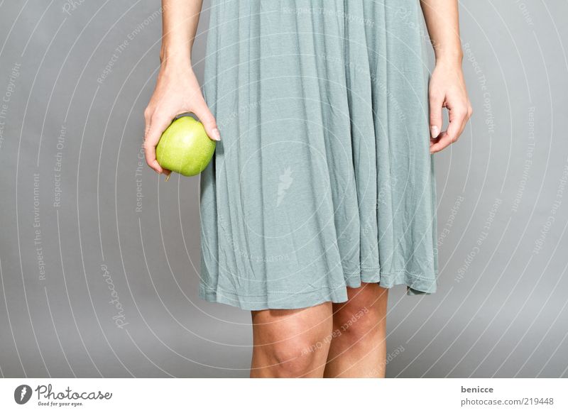 app Woman Human being Dress Apple Fruit Green To hold on Hand Fingers Legs Healthy Nutrition Diet Thin Life Diva Vegetarian diet Copy Space left Knee