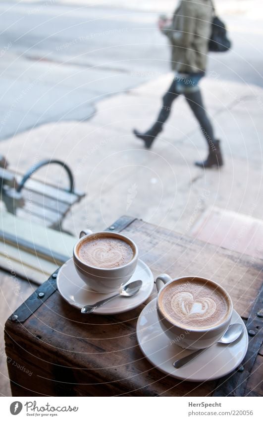 show window Beverage Coffee Cup Spoon Human being Feminine Young woman Youth (Young adults) 1 Brown Gray Pedestrian Cappuccino Heart Chest Sidewalk Bench