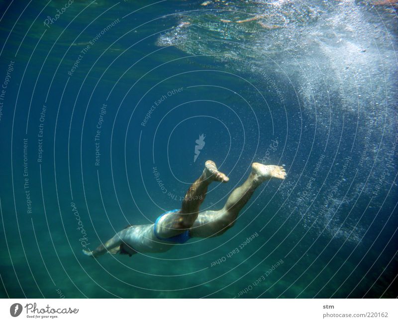 Underwater shot of a swimming man pretty Leisure and hobbies Vacation & Travel Freedom Summer Summer vacation Sun Ocean Sports Fitness Sports Training Aquatics