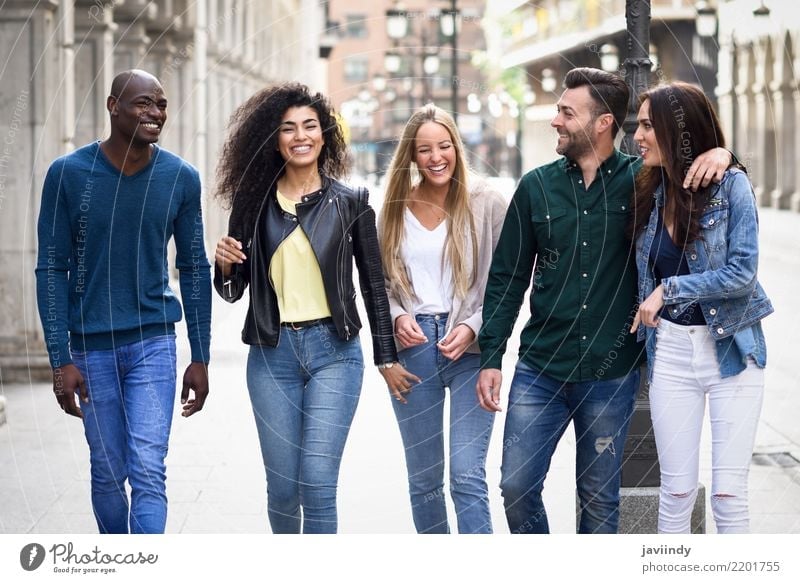 Multi-ethnic group of young people having fun together outdoors Lifestyle Joy Happy Beautiful Summer Woman Adults Man Friendship Group Street Clothing Smiling