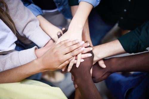 Multiracial young people putting their hands together Lifestyle Human being Woman Adults Man Friendship Hand 5 Group 18 - 30 years Youth (Young adults) Together