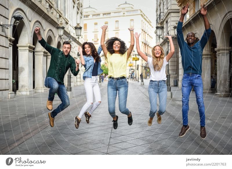 Multi-ethnic group of young people having fun together outdoors in urban background. Lifestyle Joy Happy Beautiful Summer Woman Adults Man Friendship Group