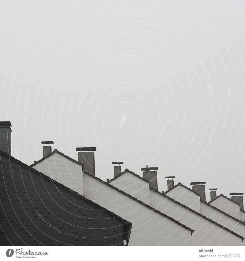neighborhood House (Residential Structure) Detached house Manmade structures Building Roof Chimney Gray Subdued colour Copy Space top Behind one another
