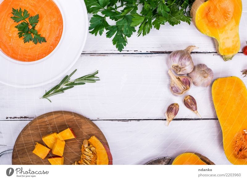 pumpkin soup in a white plate Vegetable Soup Stew Herbs and spices Nutrition Eating Lunch Dinner Organic produce Vegetarian diet Diet Plate Decoration Table