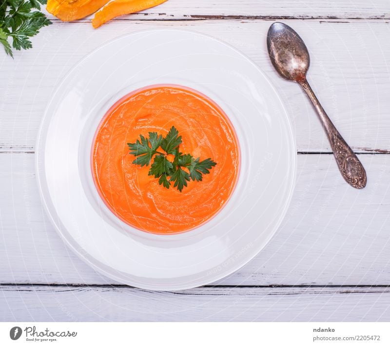 plate with cream of pumpkin soup Vegetable Soup Stew Eating Lunch Dinner Vegetarian diet Diet Plate Spoon Table Autumn Wood Fresh Hot Above Yellow White