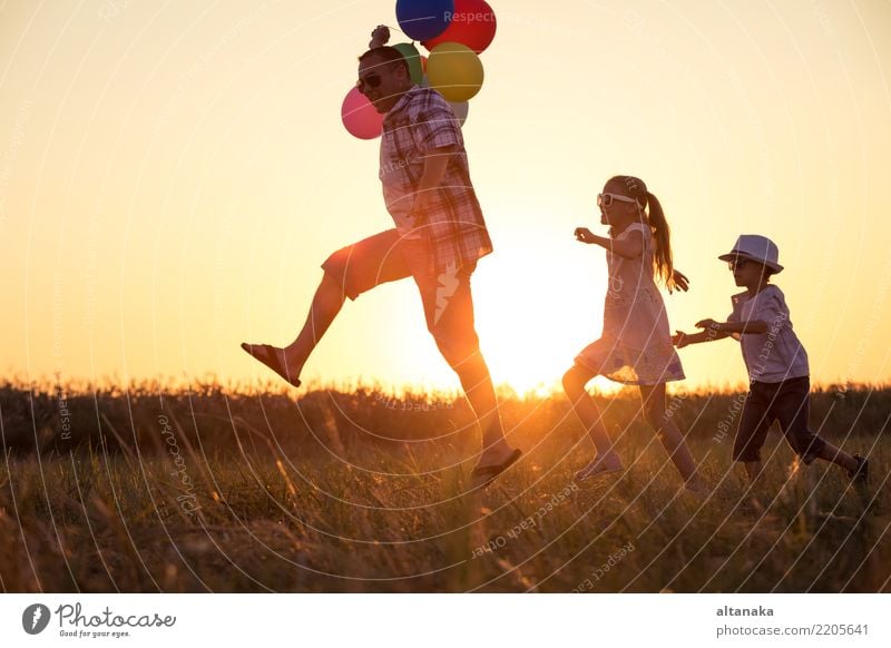 Father and children running on the road Lifestyle Joy Happy Leisure and hobbies Vacation & Travel Adventure Freedom Camping Summer Sun Sports Child Human being