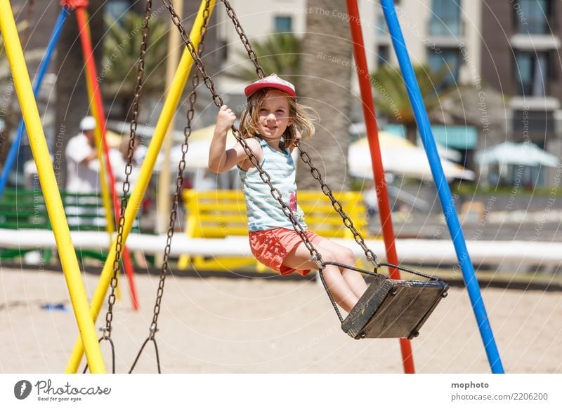 Swingin´ Lifestyle Joy Playing Parenting Kindergarten Child Girl 1 Human being 3 - 8 years Infancy Nature Sand Playground Smiling To swing Stand Happiness
