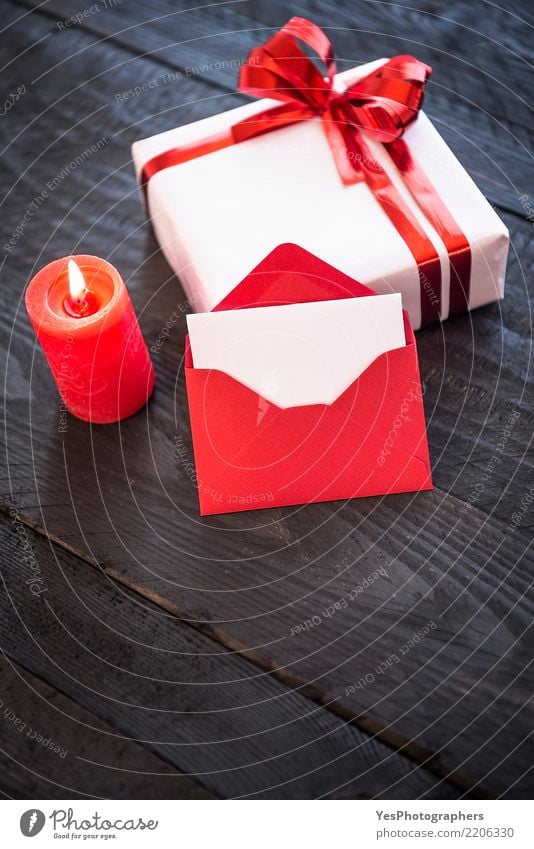 Stylish present and empty red letter Elegant Handcrafts Feasts & Celebrations New Year's Eve Birthday Package Cute Surprise above view candlelight christmas