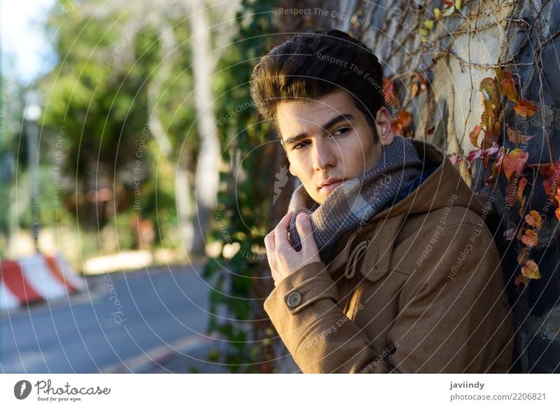 Young handsome man, model of fashion, with modern hairstyle - a Royalty  Free Stock Photo from Photocase