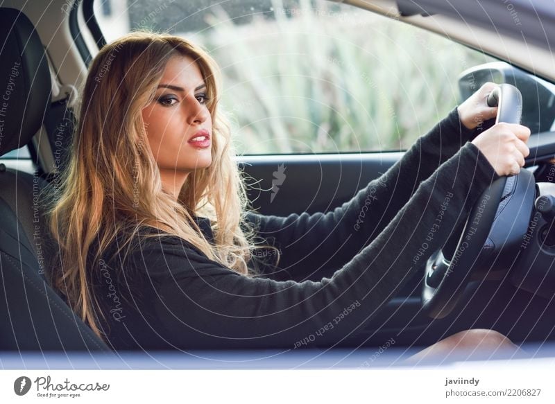 Blond young girl driving a sport car Beautiful Hair and hairstyles Human being Woman Adults Transport Vehicle Car Fashion Blonde Driving Natural White Model