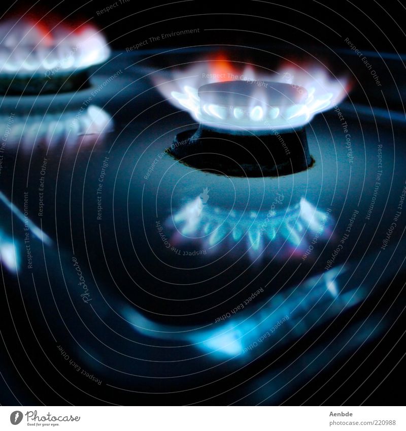 ...ring of fire... Stove & Oven Steel Exceptional Dark Warmth Blue Red Esthetic Gas burner Glint Glow Composing Gas stove Multicoloured Interior shot