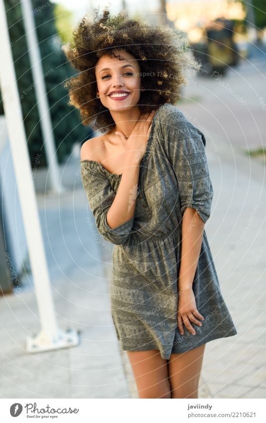 Young mixed woman with afro hairstyle smiling Lifestyle Style Happy Beautiful Hair and hairstyles Face Human being Feminine Young woman Youth (Young adults)