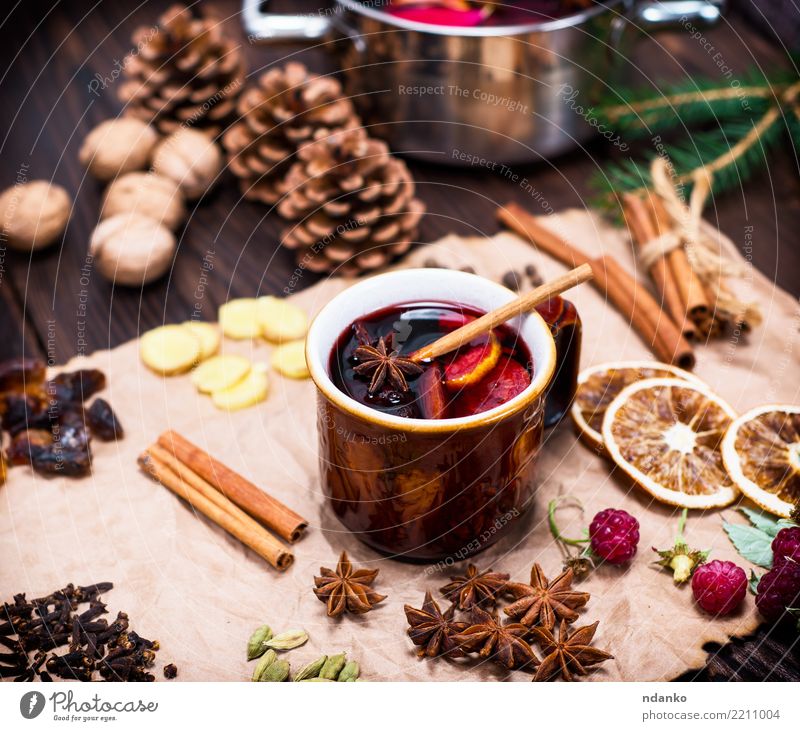 alcoholic mulled wine Herbs and spices Beverage Alcoholic drinks Mulled wine Pot Pan Paper Wood Hot Above Retro Brown Dish sweet holiday anise cup ginger