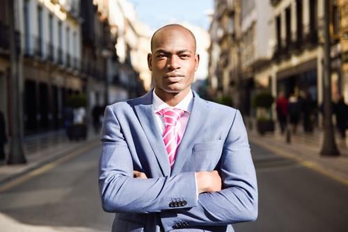 Handsome black man wearing suit in urban background Happy Beautiful Success Business Human being Masculine Man Adults 1 18 - 30 years Youth (Young adults)