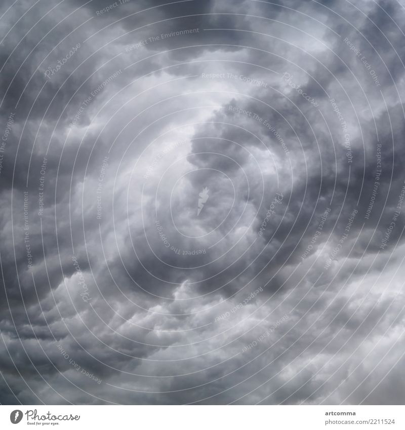 Begins a strong thunderstorm, heavy dark clouds, hurricane atmosphere black color damage disaster dramatic flood funnel gray light nature nobody panorama