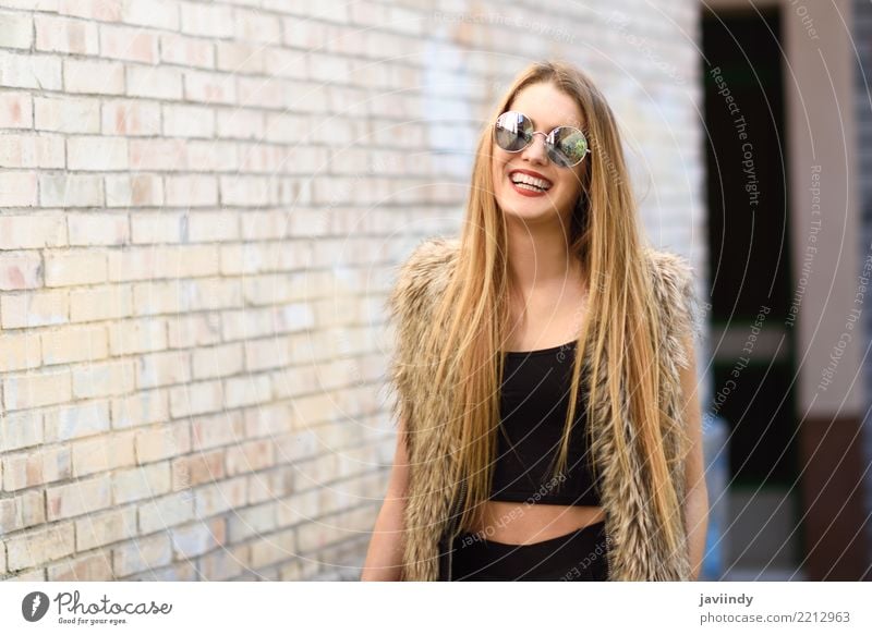 Blonde girl smiling wearing round sunglasses Lifestyle Happy Beautiful Hair and hairstyles Face Summer Human being Feminine Woman Adults Youth (Young adults) 1