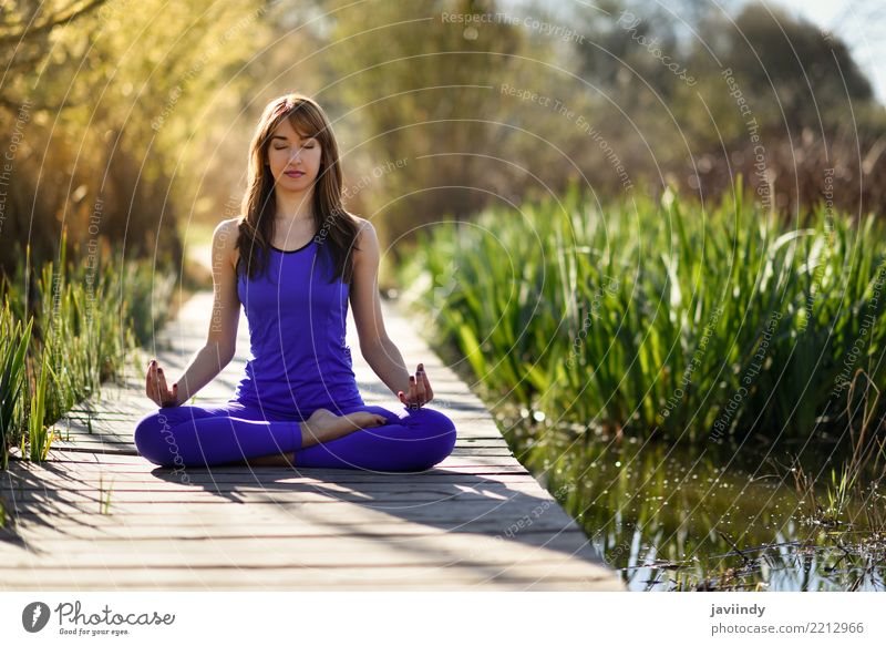 Young woman doing yoga on wooden road in nature Lifestyle Beautiful Body Relaxation Meditation Summer Sports Yoga Human being Feminine Woman Adults 1