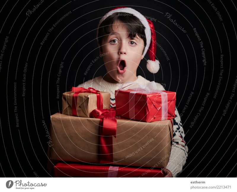 happy child with gifts at christmas Lifestyle Shopping Vacation & Travel Winter Party Event Feasts & Celebrations Christmas & Advent New Year's Eve Human being