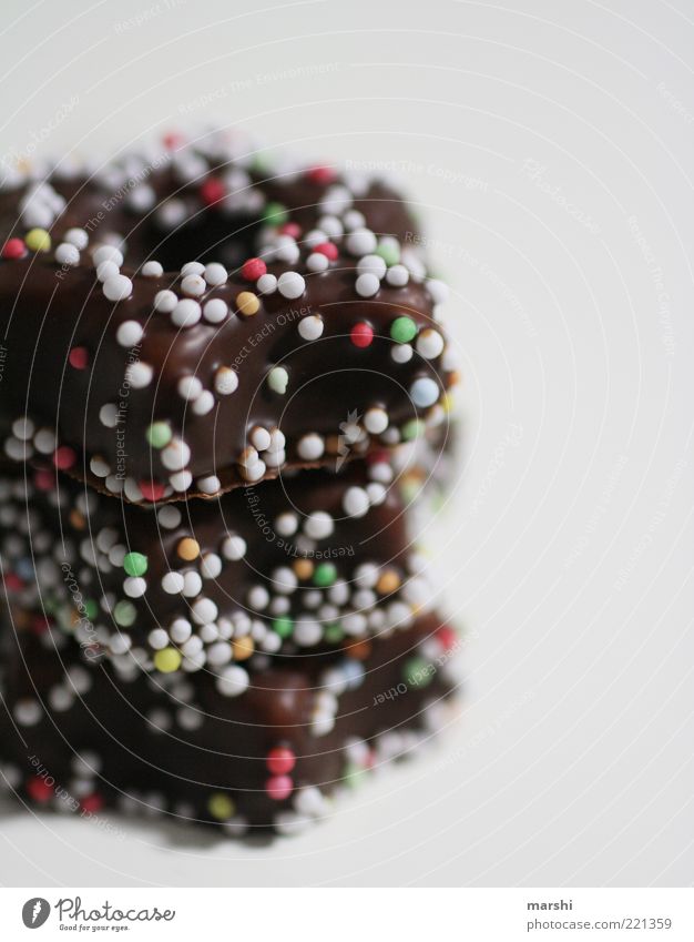 Dot on chocolate Candy Chocolate Nutrition Delicious Brown Multicoloured Point Stack Blur Unhealthy Appetite Colour photo Interior shot Granules Deserted