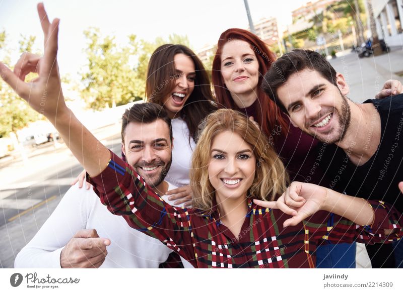 Group of friends taking selfie in urban park Lifestyle Joy Happy Beautiful Leisure and hobbies Telephone PDA Camera Human being Masculine Woman Adults Man