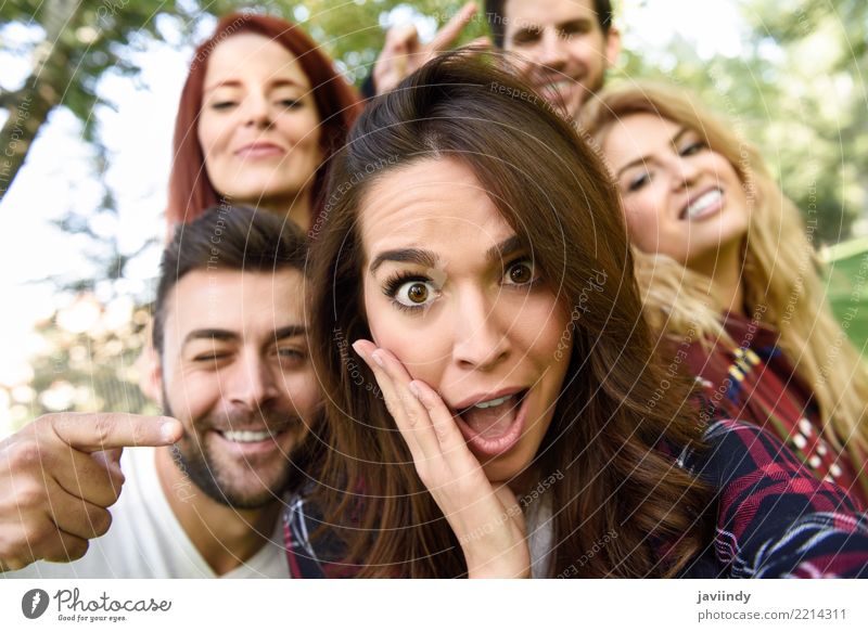 Group of friends taking selfie in urban park Lifestyle Joy Happy Beautiful Leisure and hobbies Telephone PDA Camera Human being Masculine Feminine Woman Adults