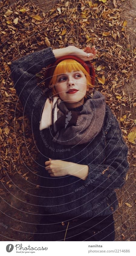 Young redhead woman in an autumn day Lifestyle Elegant Style Beautiful Human being Feminine Young woman Youth (Young adults) 1 13 - 18 years Autumn Leaf Fashion