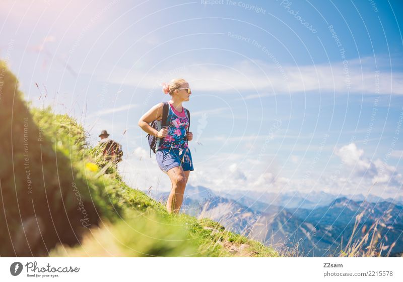 Young woman ascending Leisure and hobbies Adventure Freedom Mountain Hiking Youth (Young adults) 30 - 45 years Adults Nature Landscape Sunlight Summer