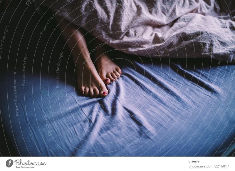 Close-up of feet sticking out of blanket in bed Happy Pedicure Nail polish Relaxation Leisure and hobbies Winter House (Residential Structure) Bedroom Feminine