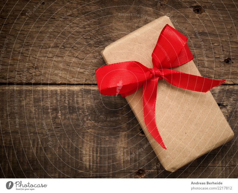 A gift Feasts & Celebrations Valentine's Day Mother's Day Christmas & Advent Birthday Love box red bow ribbon present wood wrapped holiday natural concept card