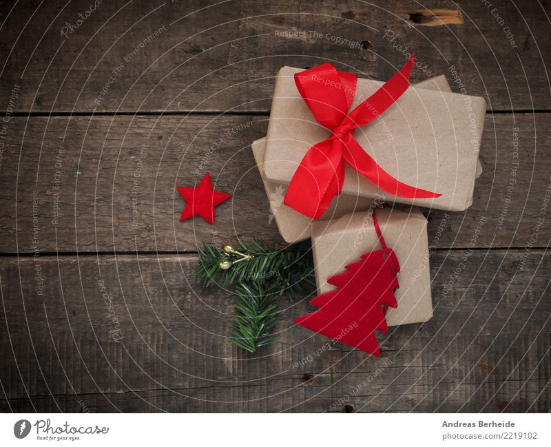 Christmas gifts Feasts & Celebrations Christmas & Advent Packaging Bow Love Joy Anticipation Together nobody one package paper parcel plank present red ribbon