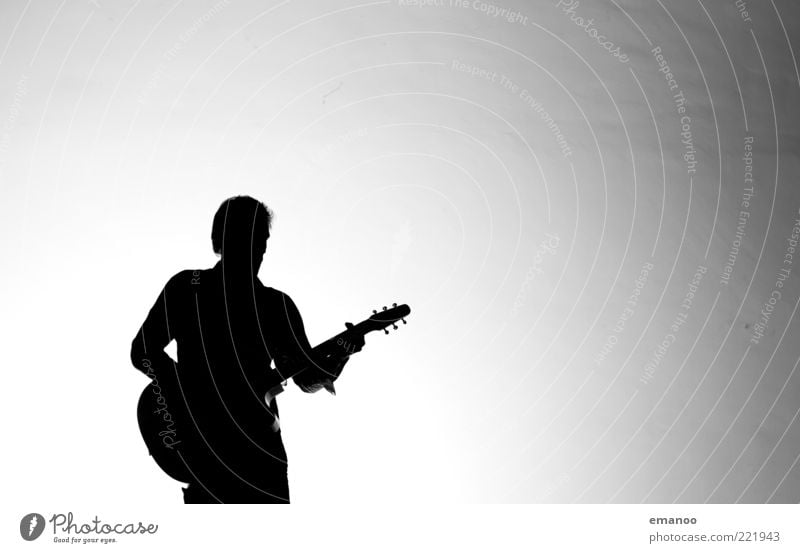 Silhouette 5 Lifestyle Leisure and hobbies Playing Music Human being Masculine 1 Art Culture Event Shows Singer Musician Guitar Stand Modern Black White Moody