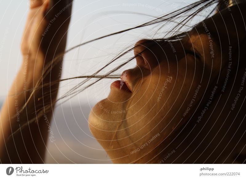Gone. Human being Young woman Youth (Young adults) Skin Face Beautiful weather Wind To enjoy Colour photo Close-up Day Profile Closed eyes Gust of wind