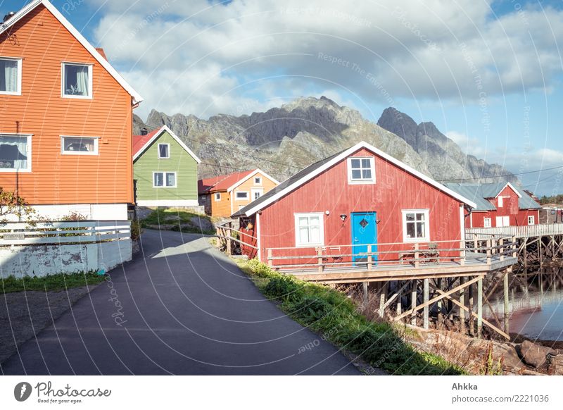 Henningsvær, colorful wooden houses in Norway Vacation & Travel Tourism Clouds Beautiful weather Mountain Coast Lofotes Fishing village Detached house Hut
