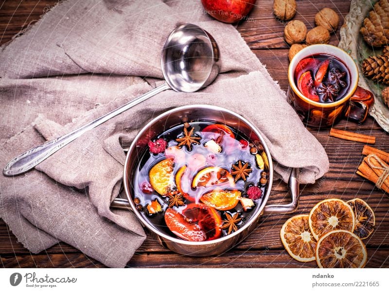 mulled wine in a saucepan Herbs and spices Beverage Alcoholic drinks Mulled wine Pot Spoon Winter Table Feasts & Celebrations Christmas & Advent Wood Hot Above