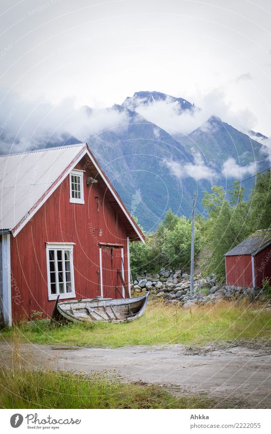 Norwegian wooden house by the fjord in front of Wolkenbergen, Svartisen Harmonious Senses Relaxation Calm Vacation & Travel Tourism Trip Adventure