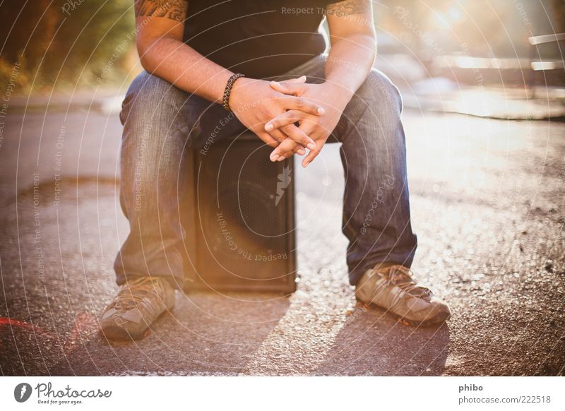 13 Leisure and hobbies Masculine Legs Human being Artist Musician Intensifier Sunrise Sunset Sunlight Street Asphalt T-shirt Jeans Footwear Sit Authentic Bright