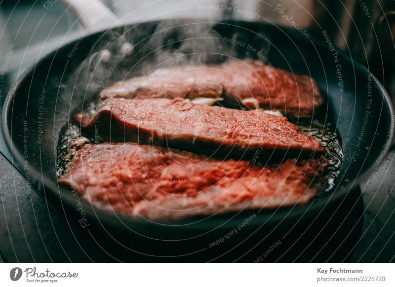Steaks in the pan Food Meat Cooking oil Frying Roast Appetite Eating Healthy Eating Food photograph Pan Lifestyle Living or residing Flat (apartment) Kitchen
