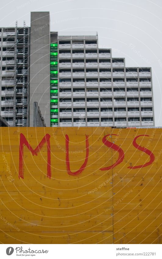 Somebody's got to be Munich House (Residential Structure) High-rise Wall (barrier) Wall (building) Facade Gloomy Must Colour photo Exterior shot Town