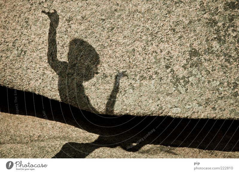 shadow play Boy (child) 1 Human being Summer Rock Stone Playing Happiness Joie de vivre (Vitality) Movement Infancy Shadow Column Dance Arm Uphold Granite