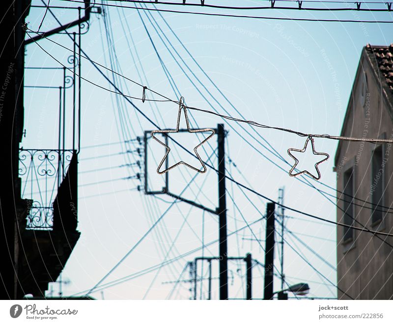Wonder stars of yesteryear Electricity pylon Cloudless sky Facade Balcony Star (Symbol) Year-round Christmas star Street art Structures and shapes