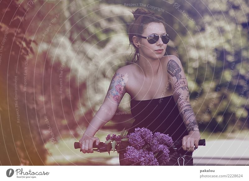 Do you hear the birds chirping? Cycling Feminine Woman Adults 1 Human being 18 - 30 years Youth (Young adults) Nature Plant Flower Park Bicycle Sunglasses