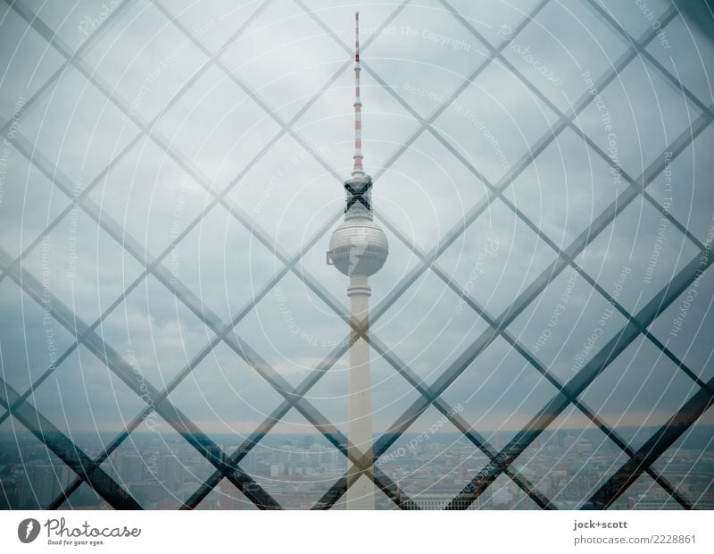 Tower in grid Tourist Attraction Landmark Berlin TV Tower Network Exceptional Sharp-edged Gray Safety Horizon Symmetry Double exposure Grid Metal grid Reaction