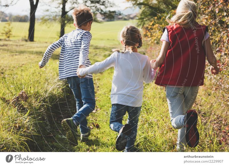 Children have fun running in nature Lifestyle Healthy Athletic Leisure and hobbies Playing Vacation & Travel Tourism Trip Parenting Schoolchild Human being