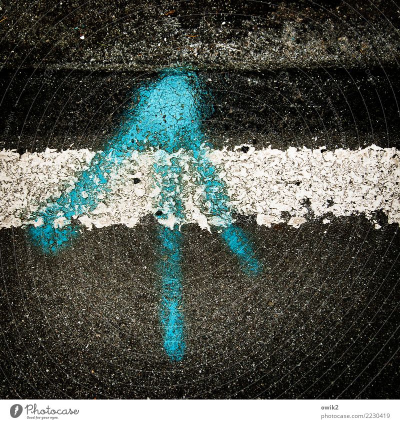 objective Graffiti Street Asphalt Lane markings Roadside Sign Arrow Old Authentic Dirty Trashy Under Gray Black Turquoise Change Direction Trend-setting