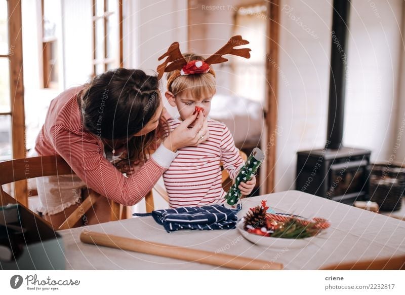 Mother and son putting christmas costume on Joy Happy Winter House (Residential Structure) Living room Christmas & Advent Toddler Parents Adults