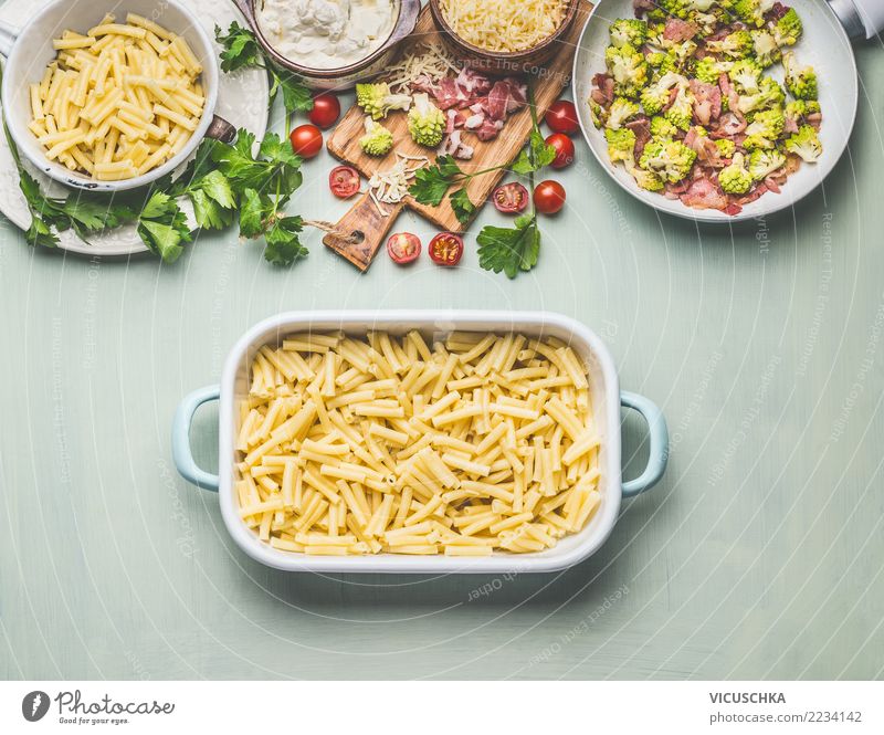 Prepare pasta gratin with broccoli and ham Food Meat Sausage Vegetable Nutrition Lunch Dinner Organic produce Crockery Style Design Living or residing Table