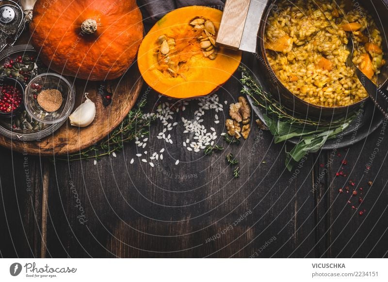 Vegetarian pumpkin risotto Food Nutrition Lunch Dinner Banquet Organic produce Diet Italian Food Pot Spoon Healthy Eating Living or residing Table Kitchen