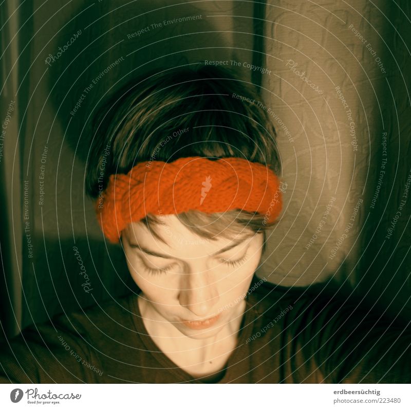 short-haired woman with a braided headband looking down in dim light Style Decoration Drape Young woman Youth (Young adults) Life Headband Short-haired Simple
