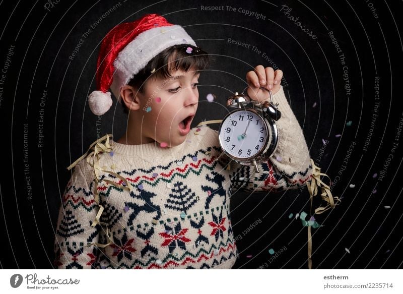 surprised child in New Year's Eve on black background Lifestyle Joy Happy Party Event Feasts & Celebrations Christmas & Advent Human being Masculine Infancy 1